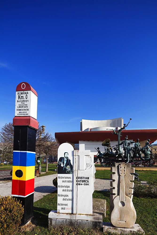 University Square, city mile marker, National Theatre, statue of musicial comedians by Ioan Bolborea, Bucharest, Romania, Europe