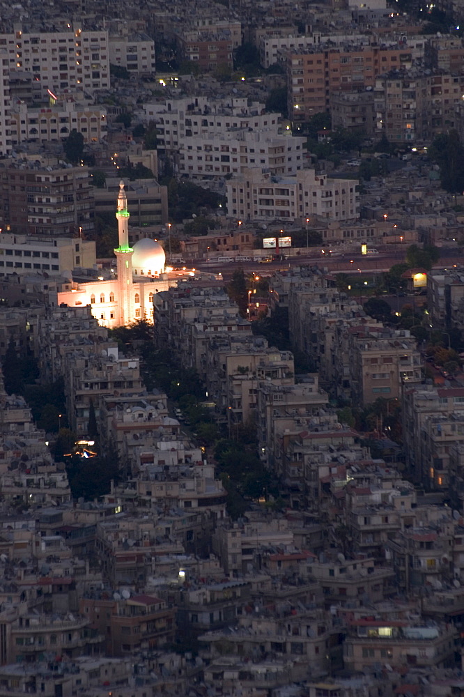 Aerial view of city at night including a floodlit mosque, Damascus, Syria, Middle East