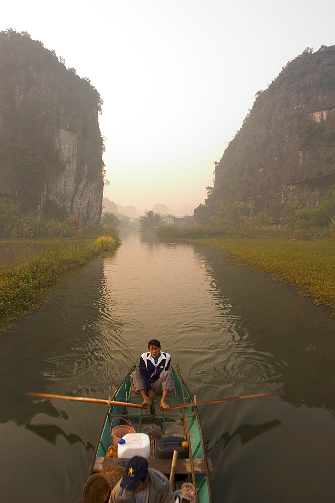 Boat on river, limestone mountain scenery, Tam Coc, Ninh Binh, south of Hanoi, North Vietnam, Southeast Asia, Asia