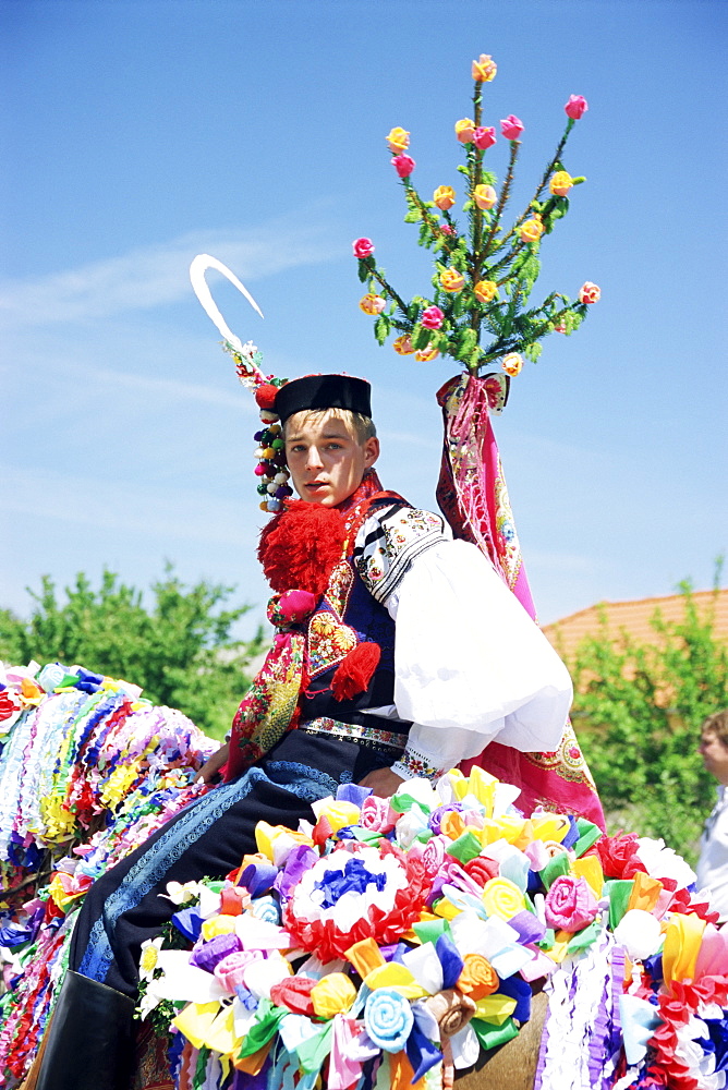 One of the king's companions wearing folk dress, Ride of the Kings Festival, village of Vlcnov, Moravian Slovacko region, Vlcnov, Zlinsko, Czech Republic, Europe