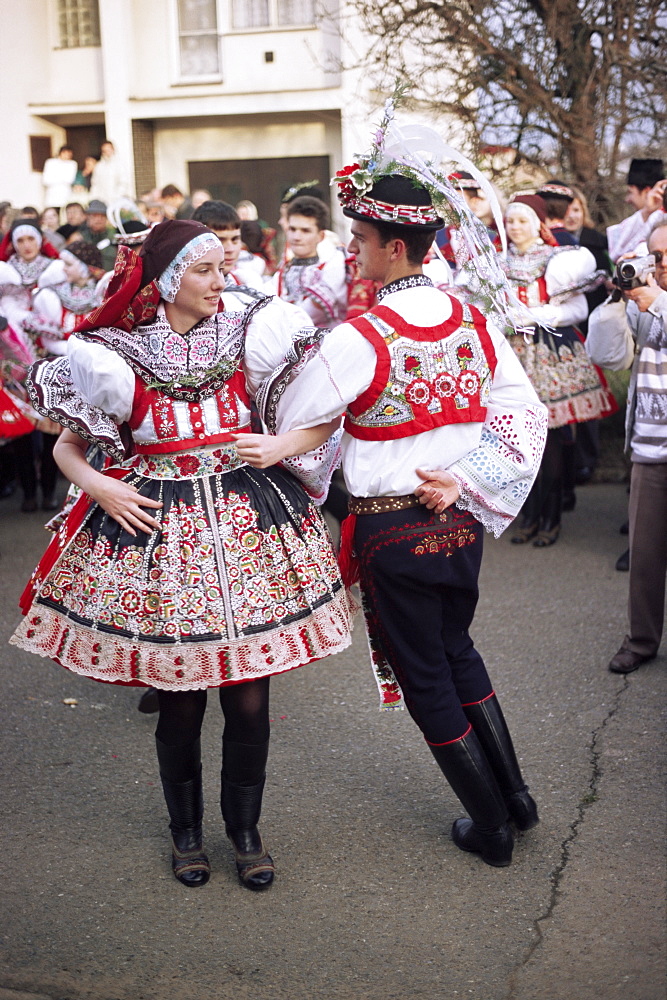 Chosen couple in traditional dress, dancing, St. Martin Feast with Wreath Festival, Svatoborice-Mistrin, Brnensko, Czech Republic, Europe