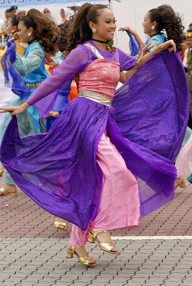 Malay female dancer wearing traditional dress at celebrations of Kuala Lumpur City Day Commemoration, Merdeka Square, Kuala Lumpur, Malaysia, Southeast Asia, Asia