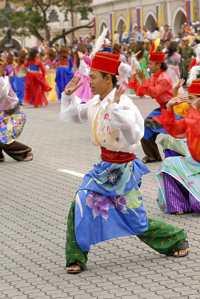 Malay dancers wearing traditional dress at celebrations of Kuala Lumpur City Day Commemoration, Merdeka Square, Kuala Lumpur, Malaysia, Southeast Asia, Asia