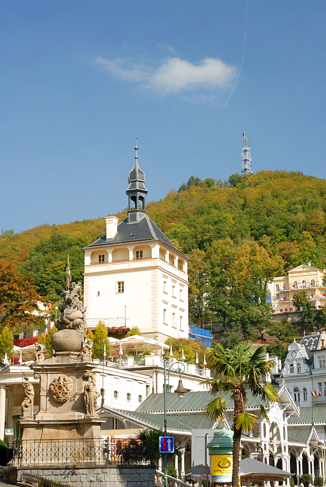 Baroque Plague Column and 19th century spa buildings in spa town of Karlovy Vary, Karlovarsky Region, West Bohemia, Czech Republic, Europe