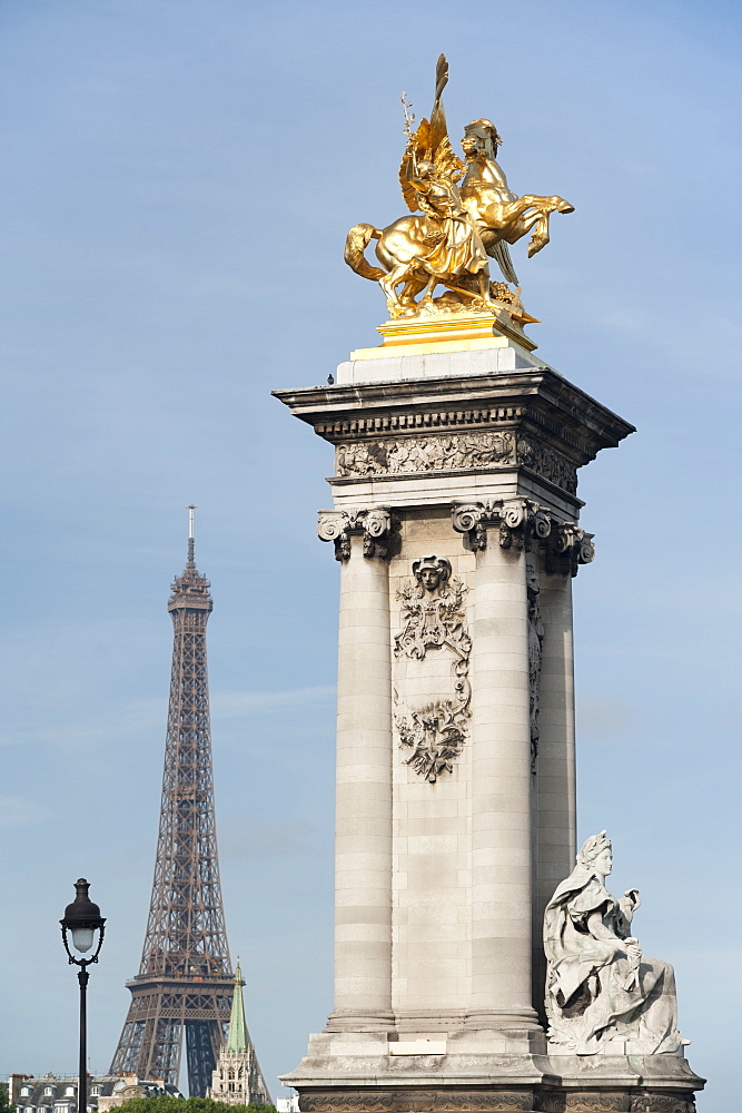 Decorated pillar of Alexandre III Bridge and the Eiffel Tower, Paris, France, Europe