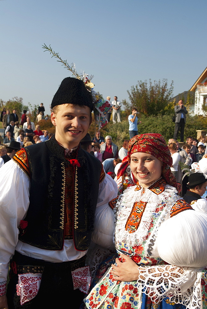 Woman and man wearing folk dress during autumn Feast with Law Festival, Borsice, Brnensko, Czech Republic, Europe