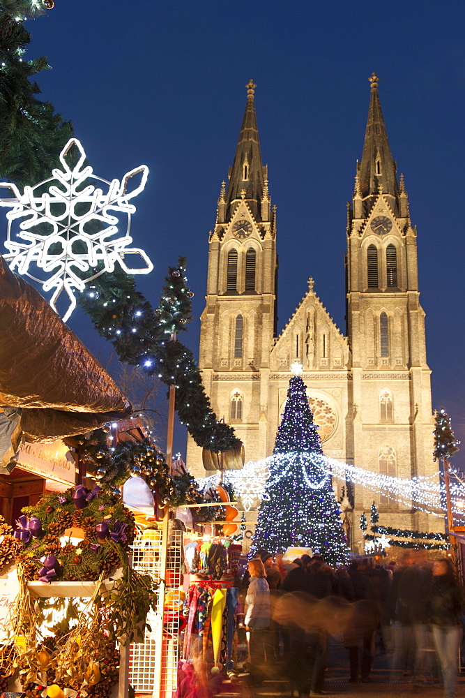 Christmas market and neo-gothic Church of St. Ludmila, Mir Square, Prague, Czech Republic, Europe 