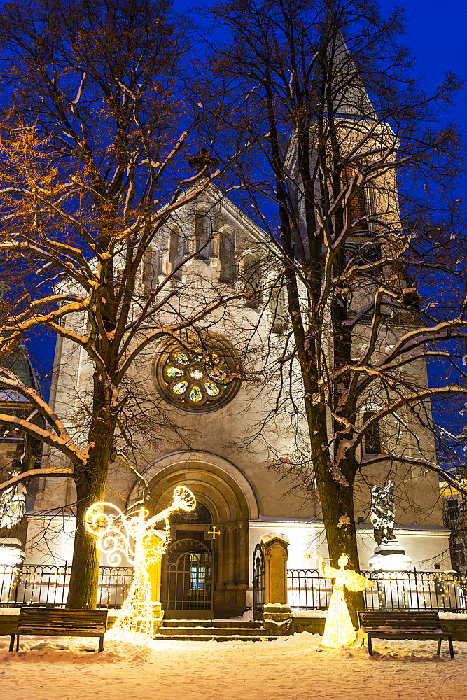 Snow-covered neo-Romanesque Church of Saint Remigius dating from 1881, Cakovice, Prague, Czechia, Europe