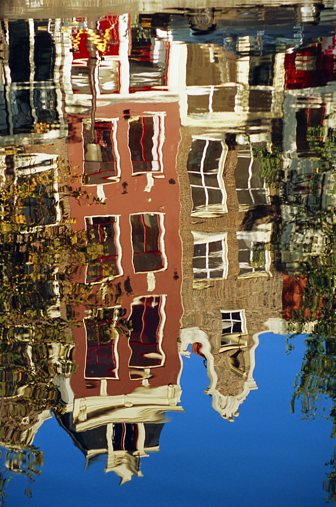 Reflection of Amsterdam houses in canal, Amsterdam, the Netherlands (Holland), Europe