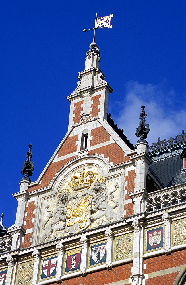 Detail of coats of arms on the facade of the Central Station, Amsterdam, The Netherlands (Holland), Europe