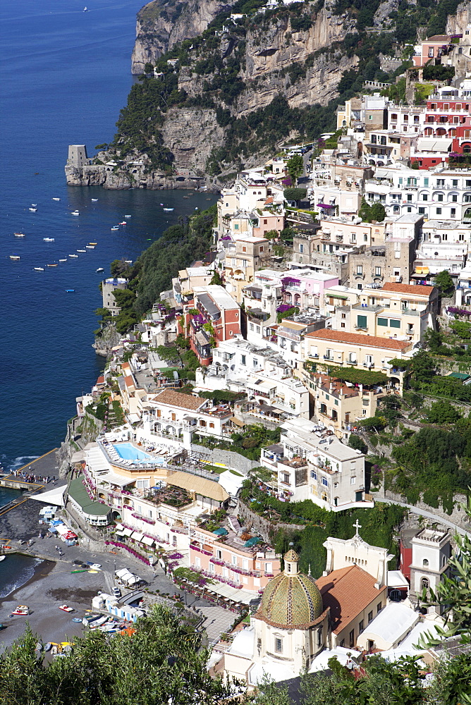 View of Positano with the typical majolica dome of Santa Maria Assunta, Costiera Amalfitana, UNESCO World Heritage Site, Campania, Italy, Europe