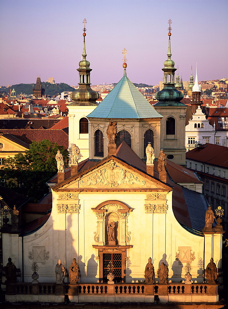 Christian church and spires on the city skyline, Prague, Czech Republic, Europe