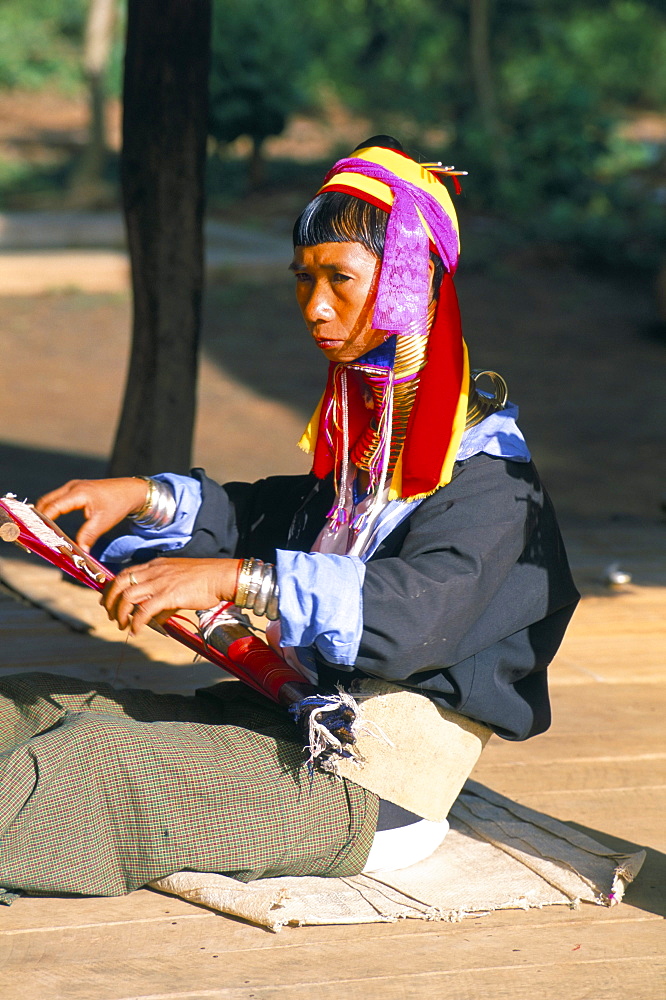 Padaung woman weaving, Inle Lake, Shan State, Myanmar (Burma), Asia