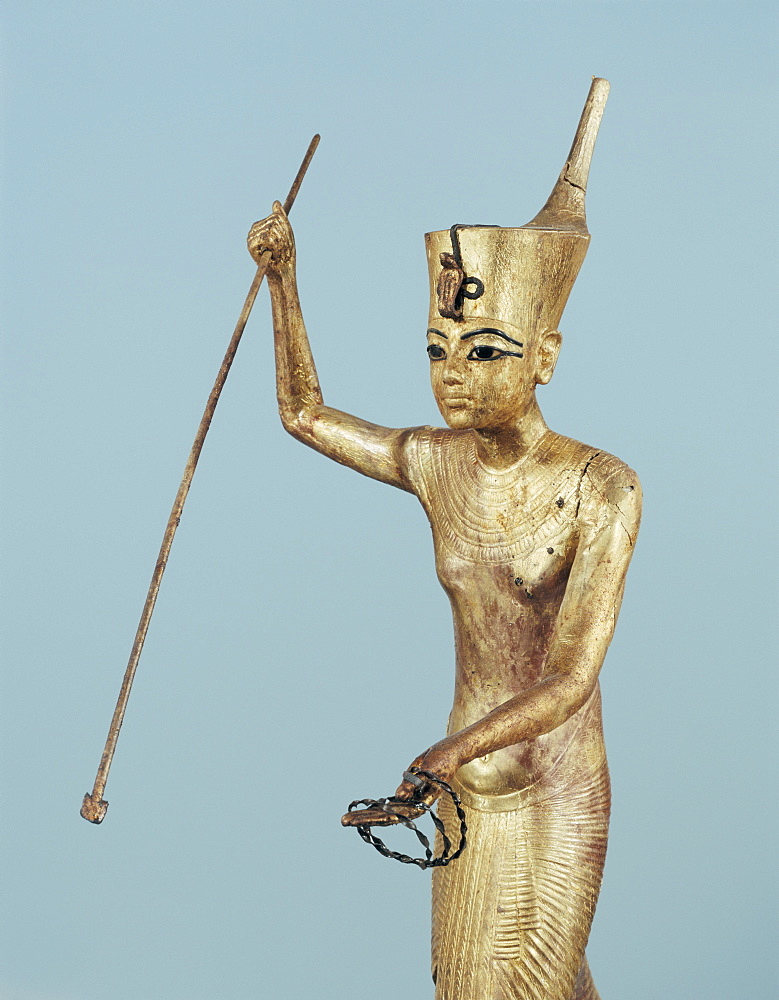 Gilt wood statuette of Tutankhamun on a boat with a harpoon, from the tomb of the pharaoh Tutankhamun, discovered in the Valley of the Kings, Thebes, Egypt, North Africa, Africa