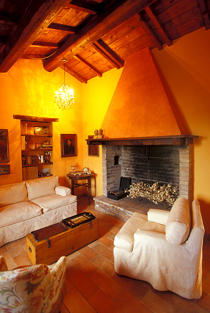 Locanda delle Fontanelle, parlour with fireplace , Montemelio, Solomeo, Umbria, Italy