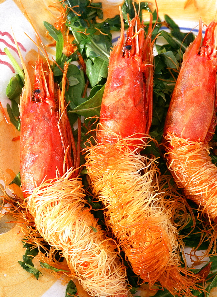 Big crayfishes in "Kataifi" pasta and sea urchin mayonnaise, Orestorante restaurant, Ponza island, Lazio, Italy 