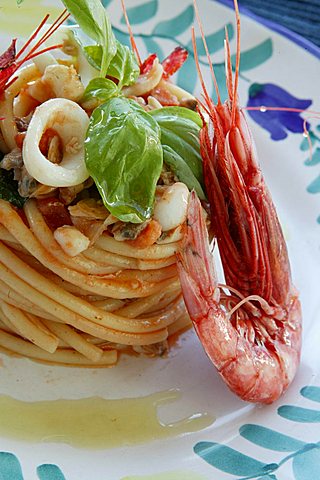 Bucatini pasta with fish amatriciana sauce, Orestorante restaurant, Ponza island, Lazio, Italy 