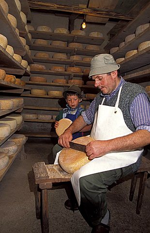 Cheese preparation, Malga Monte Sole Alta, Val di Rabbi, Stelvio national park, Trentino Alto Adige, Italy