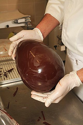 Chocolate egg is ready for decoration, Easter egg preparation, Bar Centrale, Lecco, Lombardy, Italy