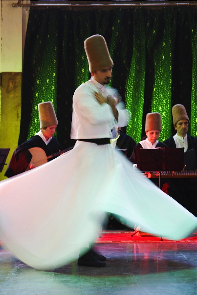 Mevlana Whirling Dervishes perform Sema, Sirkeci Central Train Station hall, Istanbul, Turkey, Europe