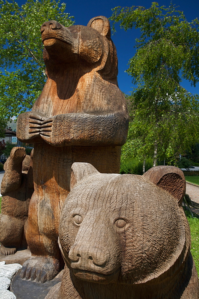 Bears wood sculptures near Strembo village, head office of the Parco Naturale Adamello Brenta park, Valli Giudicarie, Trentino Alto Adige, Valle Rendena, Italy, Europe