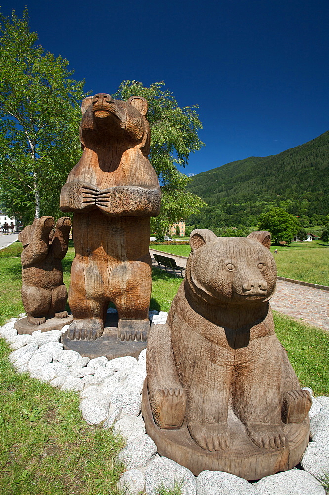 Bears wood sculptures near Strembo village, head office of the Parco Naturale Adamello Brenta park, Valli Giudicarie, Trentino Alto Adige, Valle Rendena, Italy, Europe