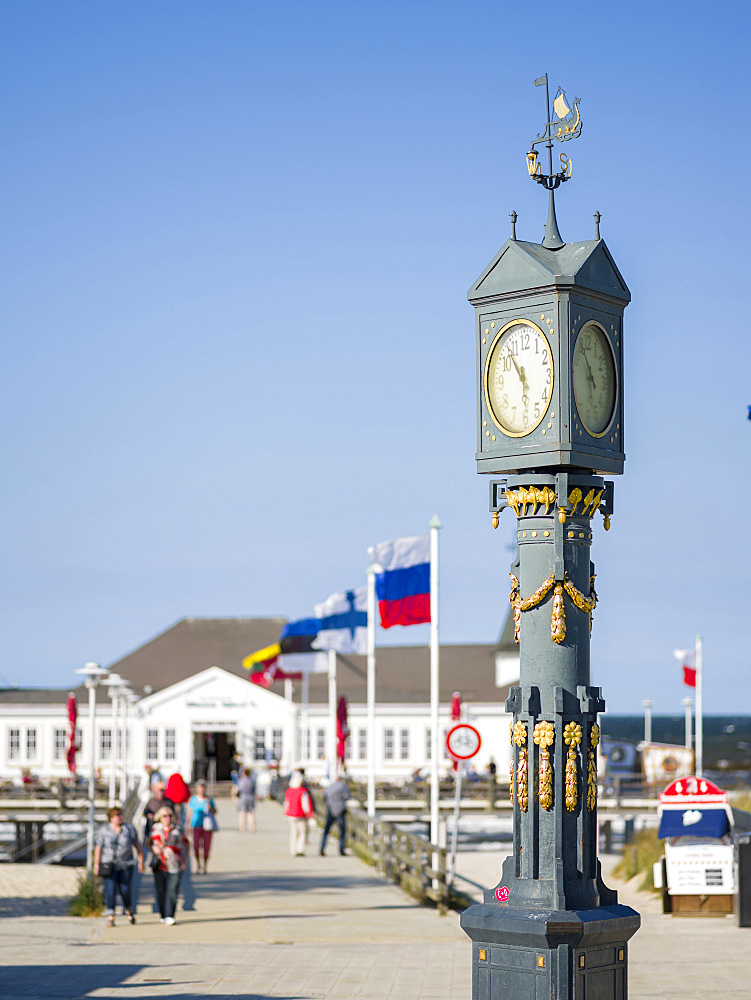 The art nouveau clock at the  famous pier in Ahlbeck on the island of Usedom.  Europe,Germany, Mecklenburg-Western Pomerania, Usedom, June
