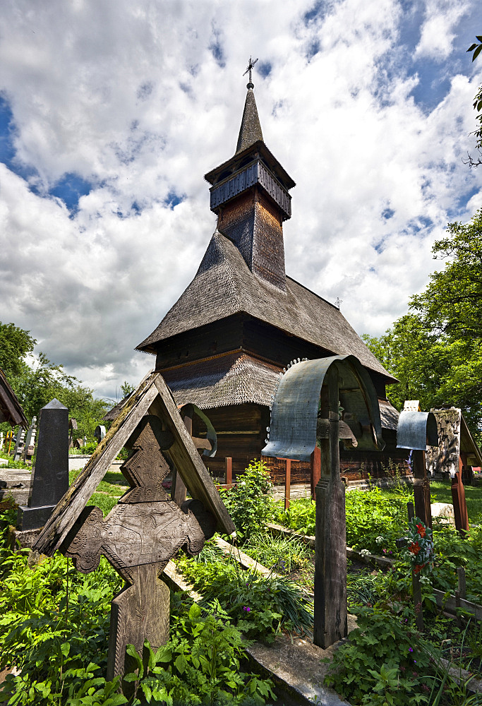 Wooden Church in Ieud (Biserica de Lemn din Deal, Nasterea Maicii Domnului), Maramures, Romania is listed as UNESCO World heritage. Built in 1364 the church is the oldest wooden church in Maramures and shows the traditionall crafts of the carpenters in Maramures.Europe, Eastern Europe, Romania, maramures