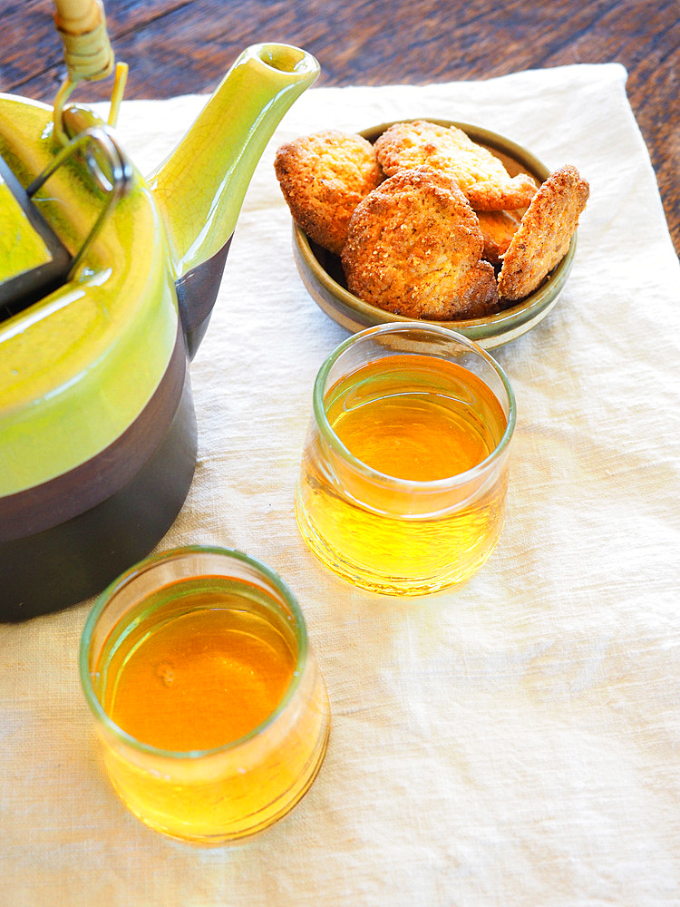 Ginger herbal tea, herbs and homemade organic flour cookies, Umbria, Italy, Europe