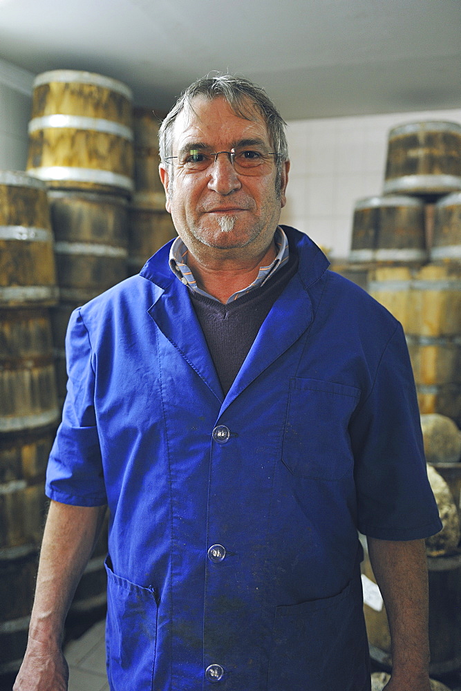 Portrait of Battista, fisherman and owner of the company Delfino which produces oil and salted anchovies, tuna and the famous Anchovy sauce called Colatura, Cetara, Amalfi Coast, Campania, Italy.