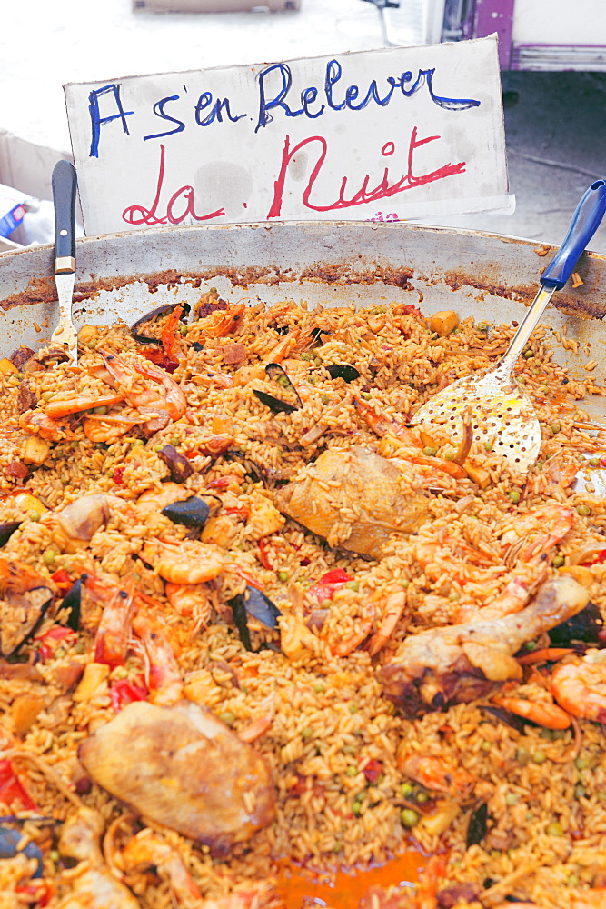 Regain strength from last night! Paella provençal at the summer market in Port Grimaud, Provence, France.