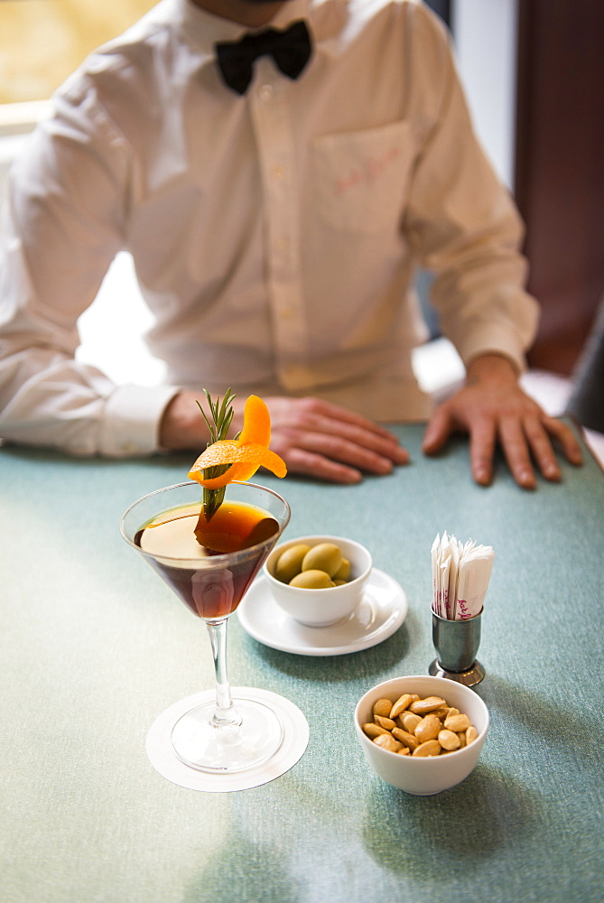 Still life of Zazou cocktail with olives and almonds at Bar Luce, Fondazione Prada, Milano, Lombardy, Italy, Europe