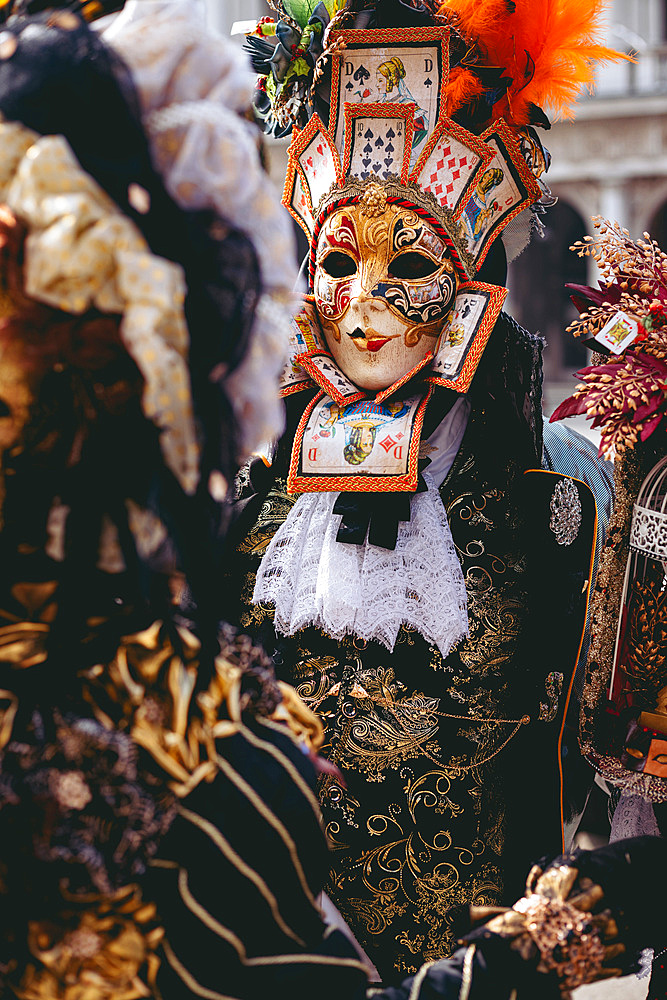 Portrait of a couple with beautiful masks in Venice, Veneto, Italy, Europe