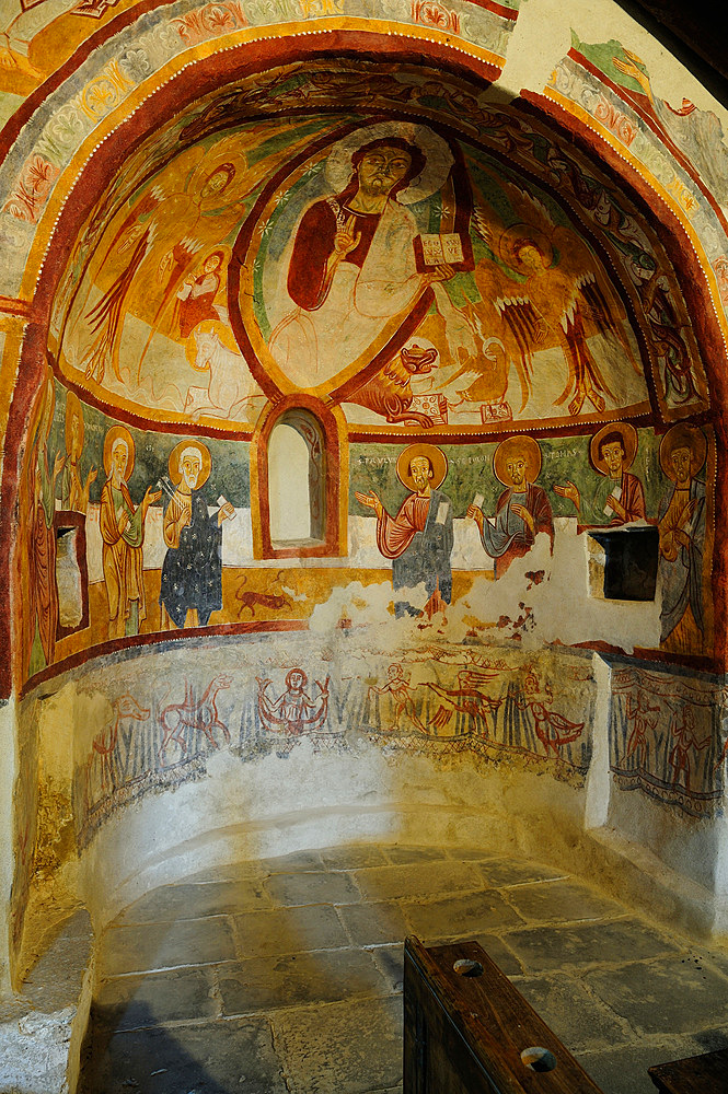 The parish church of San Maurizio, unusual architecture with two apses, decorated with three successive campaigns of frescoes between 1050 and 1486. Roccaforte, Ligurian Alps, Cuneo, Piedmont, Italy, Europe