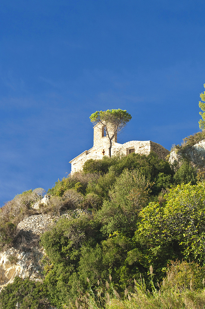 The church of San Lorenzo during the excursion to the Capo Noli traffic light, climbing from Varigotti. Noli, Savona, Liguria, Italy