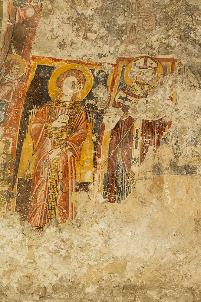 San Michele Arcangelo and San Eligio Bishop in the frescoes of the 13th-15th century. in the rock church of San NicolÚ, city of Modica, Ragusa, Sicily, Italy, Europe; UNESCO World Heritage Site