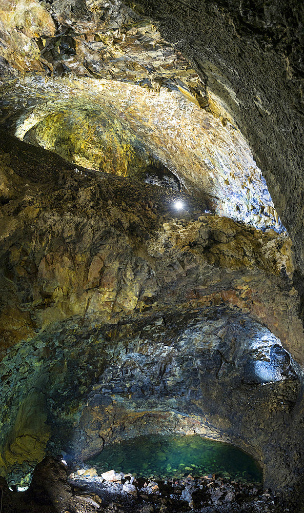 Algar do Carvao, a volcanic vent and landmark of the island, the lake in the cave. Island Ilhas Terceira, part of the Azores (Ilhas dos Acores) in the atlantic ocean, an autonomous region of Portugal. Europe, Azores, Portugal.