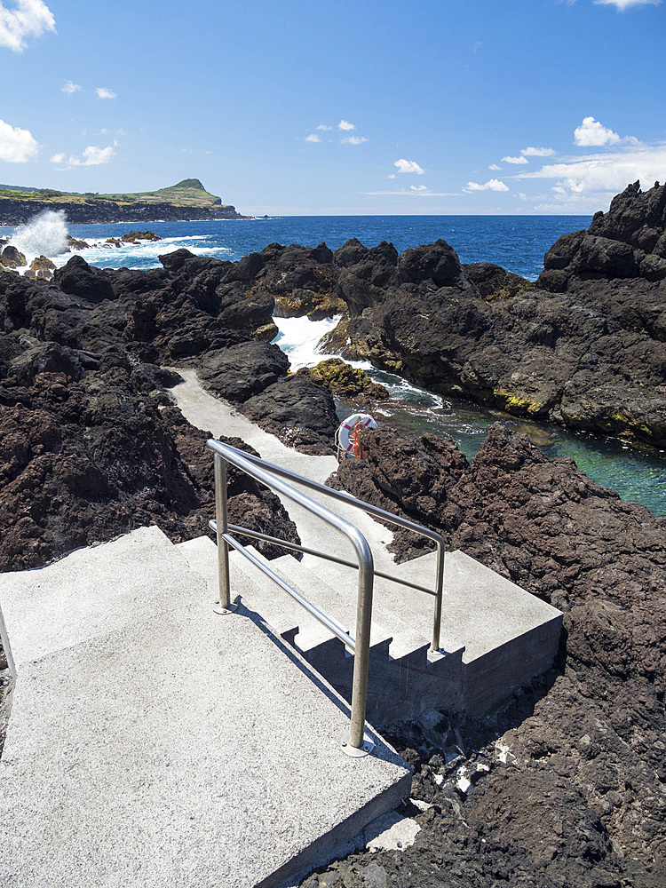 Coast with lava flow and beach near Biscoitos. Island Ilhas Terceira, part of the Azores (Ilhas dos Acores) in the atlantic ocean, an autonomous region of Portugal. Europe, Azores, Portugal.