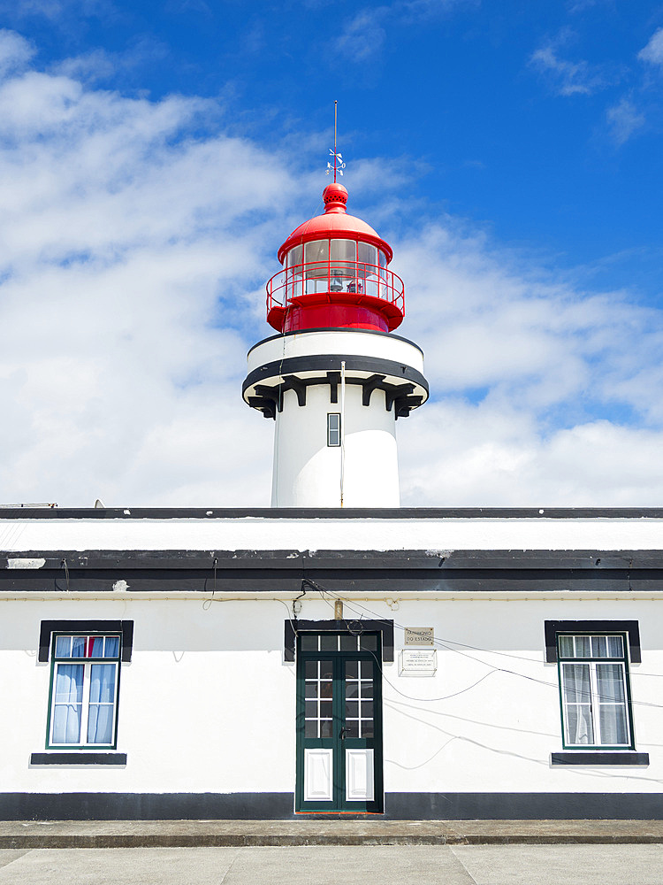 Ponta do Topo with lighthouse, at the eastern part of the island. Sao Jorge Island, an island in the Azores (Ilhas dos Acores) in the Atlantic ocean. The Azores are an autonomous region of Portugal. Europe, Portugal, Azores