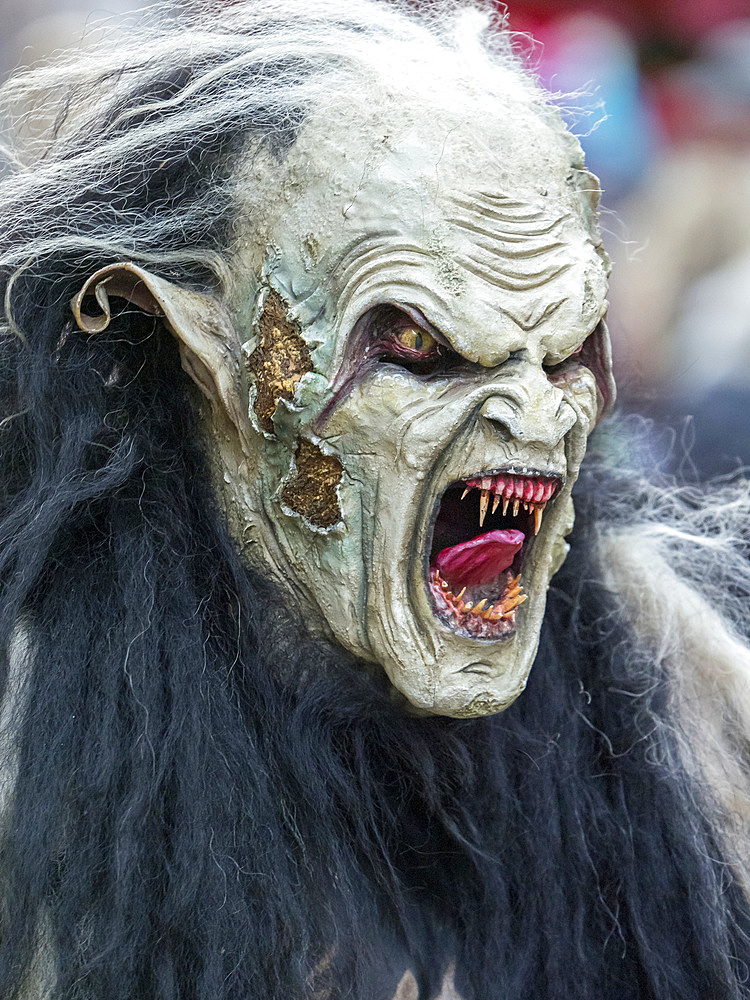 Krampuslauf or Perchtenlauf during advent in Munich, an old alpine tradition taking place during christmas time in Bavaria, Austria and South Tyrol. Europe, Central Europe, Germany, Bavaria, December