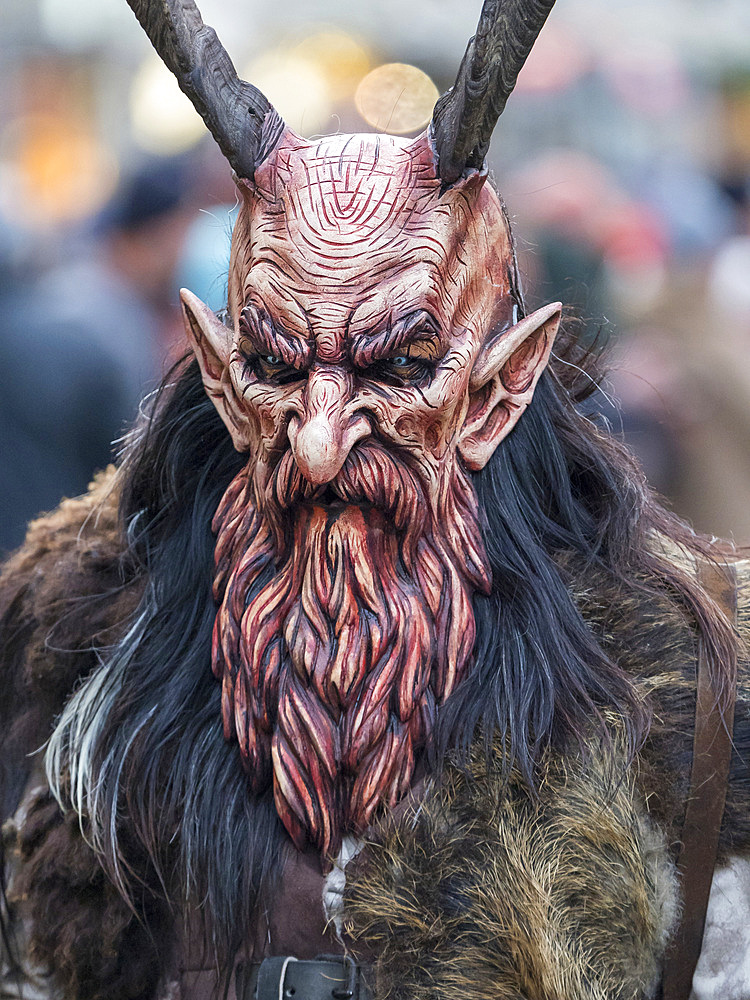 Krampuslauf or Perchtenlauf during advent in Munich, an old alpine tradition taking place during christmas time in Bavaria, Austria and South Tyrol. Europe, Central Europe, Germany, Bavaria, December