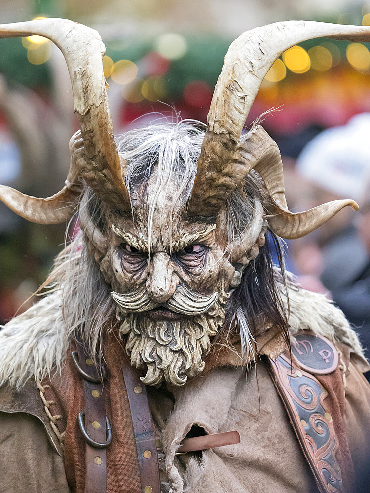 Krampuslauf or Perchtenlauf during advent in Munich, an old alpine tradition taking place during christmas time in Bavaria, Austria and South Tyrol. Europe, Central Europe, Germany, Bavaria, December