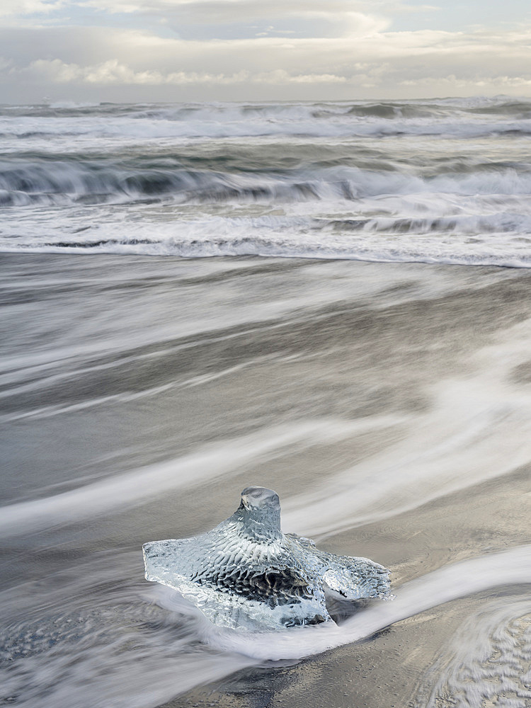 Icebergs on black volcanic beach. Beach of the north atlantic near the glacial lagoon Joekulsarlon and glacier Breithamerkurjoekull in the Vatnajoekull NP.europe, northern europe, iceland, February