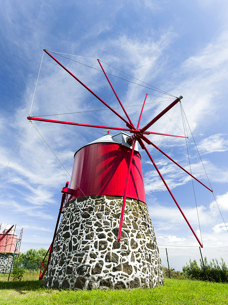 Traditional windmill in Conceicao near Horta. Faial Island, an island in the Azores (Ilhas dos Acores) in the Atlantic ocean. The Azores are an autonomous region of Portugal.