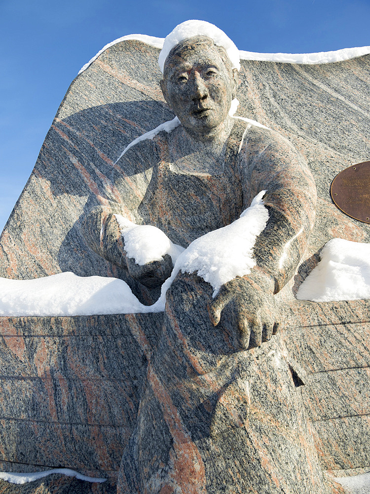 Monument commemorating the traditional processing of halibut. Town Ilulissat at the shore of Disko Bay in West Greenland, center for tourism, administration and economy. The icefjord nearby is listed as UNESCO world heritage. America, North America, Greenland, Denmark