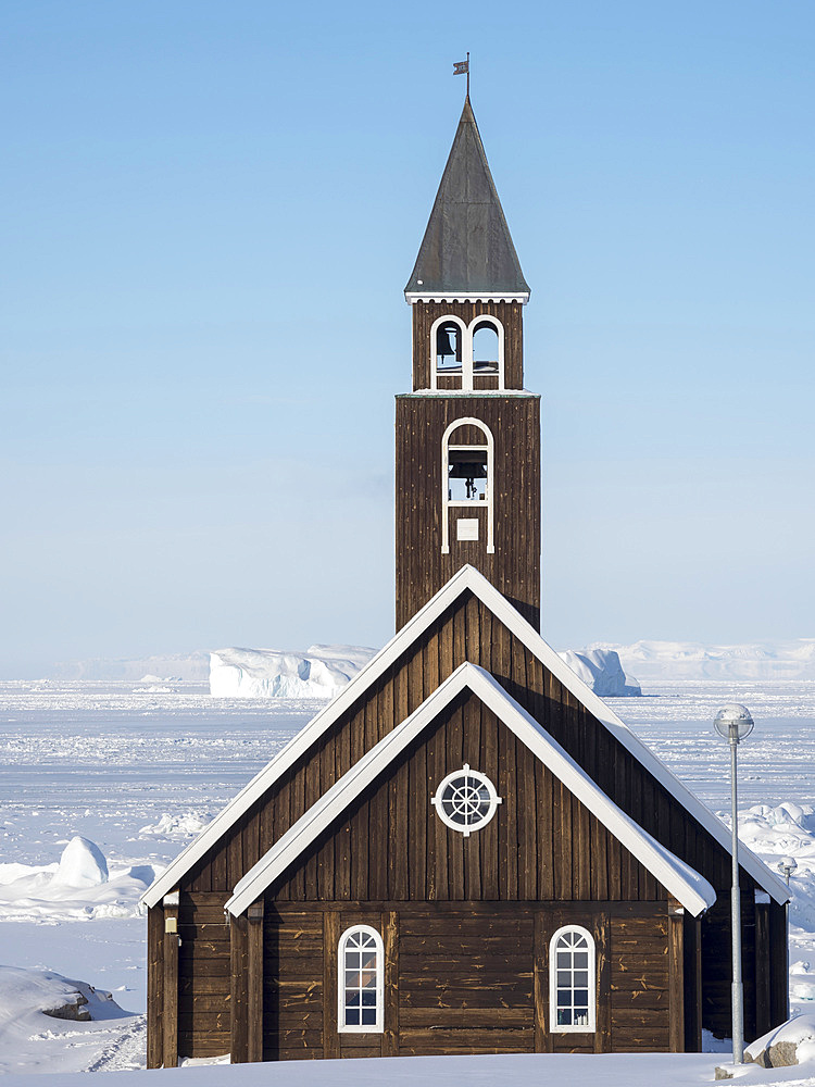 The Zion s Church. Town Ilulissat at the shore of Disko Bay in West Greenland, center for tourism, administration and economy. The icefjord nearby is listed as UNESCO world heritage. America, North America, Greenland, Denmark