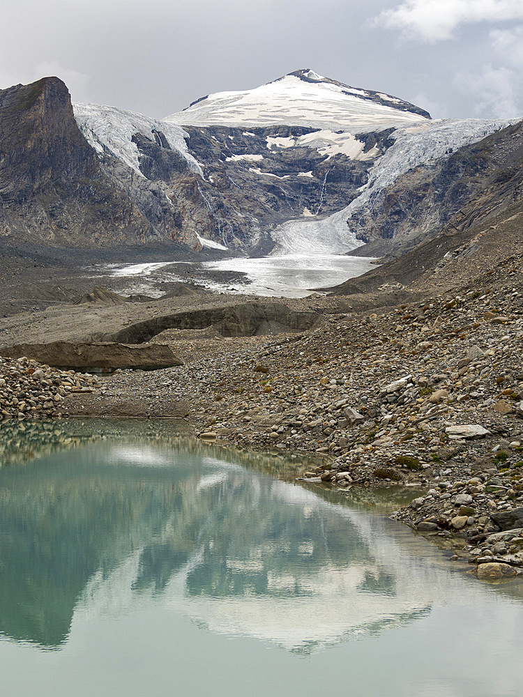 Mount Johannisberg and glacier Pasterze at Mount Grossglockner, which is melting extremely fast due to global warming. Europe, Austria, Carinthia