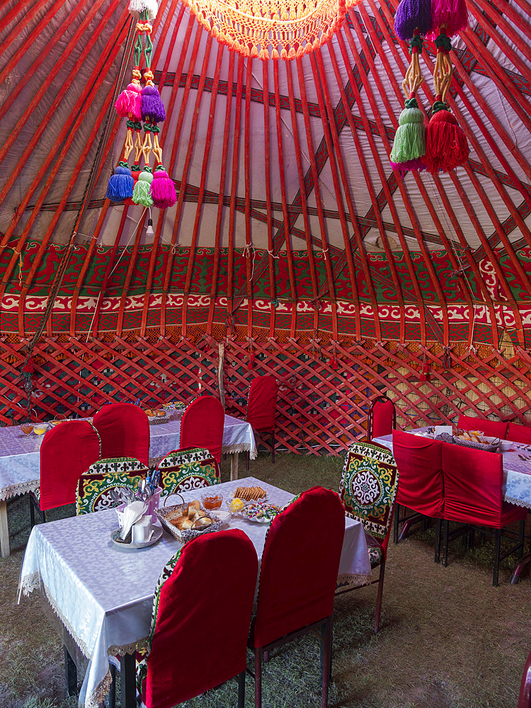 Yurts for tourists at lake Song Kol (Son Kul, Songkoel, Song-Koel). Tien Shan mountains or heavenly mountains in Kirghizia. Asia, central Asia, Kyrgyzstan