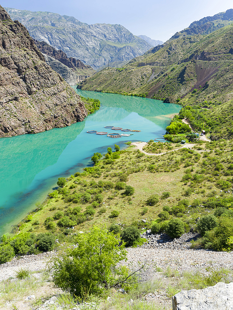 Landscape along the Tien Shan Highway, the Kurpsai Reservoir, at river Naryn in the Tien Shan or heavenly mountains. Asia, Central Asia, Kyrgyzstan