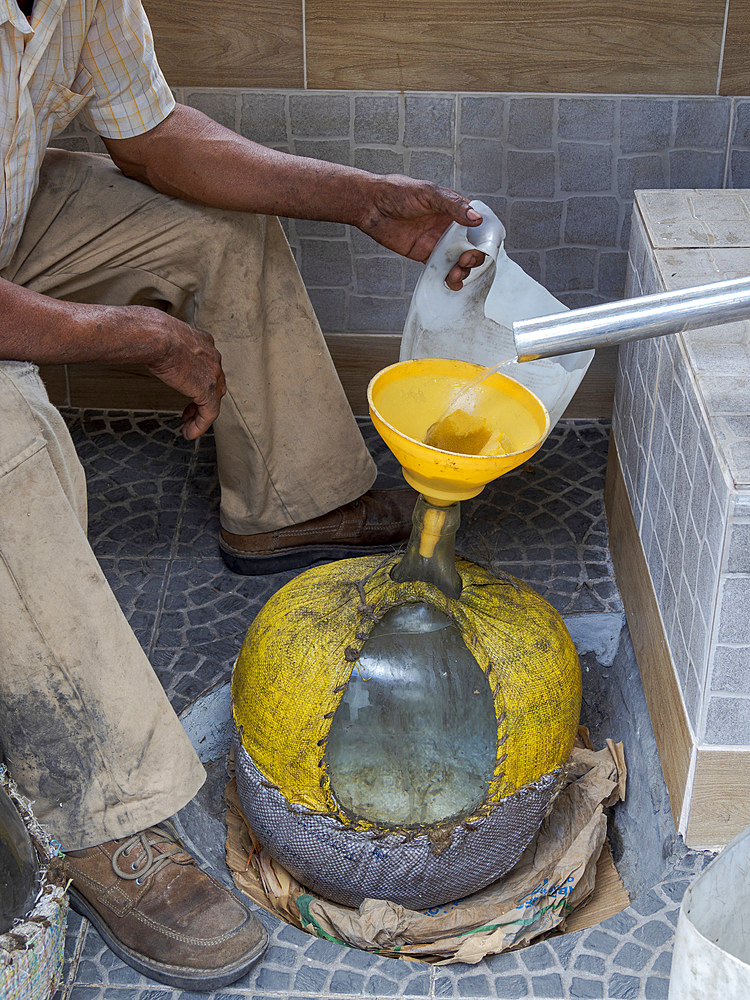 Distillery for Grogue, the local and iconic liquor produced from sugarcane. Valley Ribeira do Paul on the island Santo Antao, Cape Verde in the equatorial atlantic. April